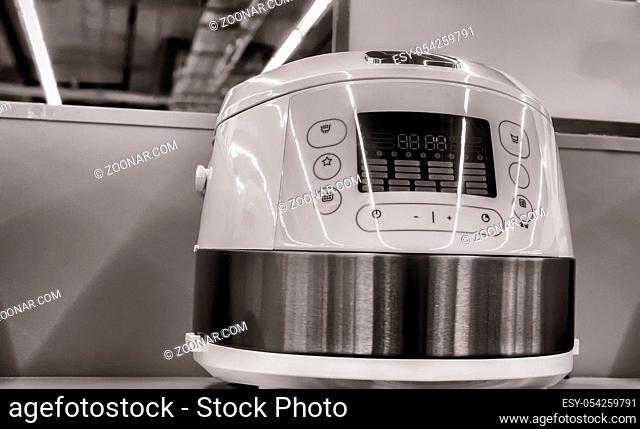 Household appliances: electric multifunctional cooking pot . Presented on the shop window