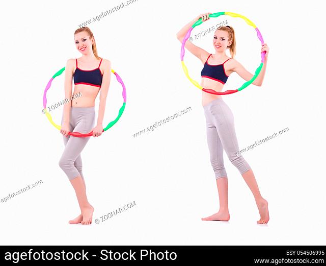 The woman doing exercises with hula hoop