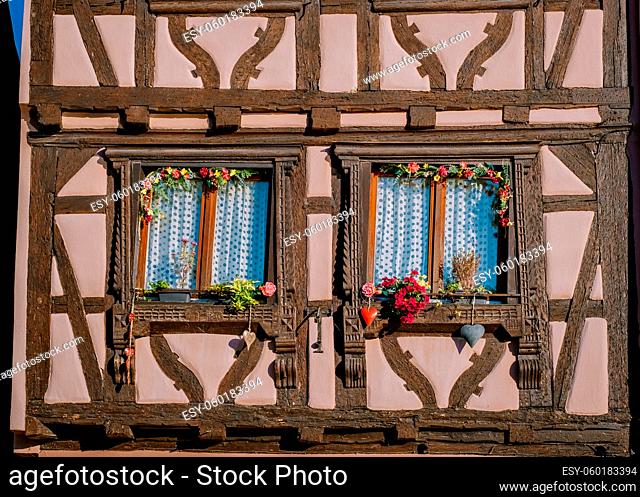Windows of a house in Eguisheim, Alsace, France. colorful old house France