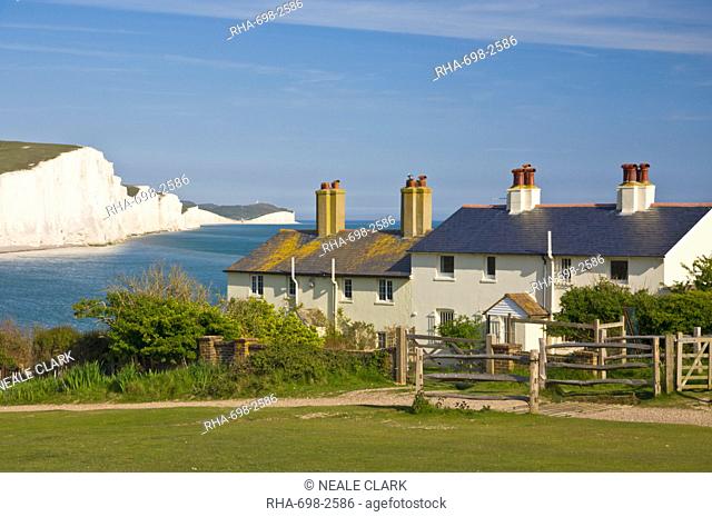 View of The Seven Sisters cliffs, the coastguard cottages on Seaford Head, South Downs Way, South Downs National Park, East Sussex, England, United Kingdom