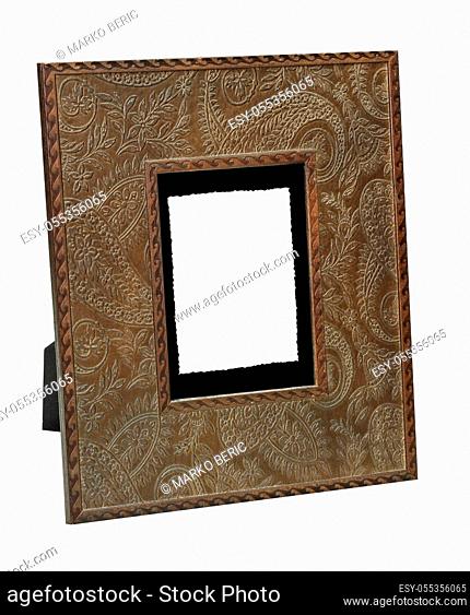 Wooden picture empty frame engraved and isolated