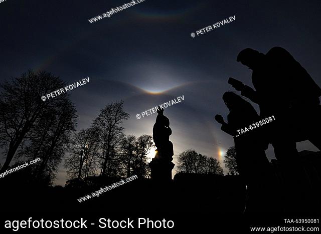 RUSSIA, ST PETERSBURG - OCTOBER 26, 2023: A Sun halo is seen over a statue of Andromeda at the Tsarskoye Selo museum estate, outside St. Petersburg