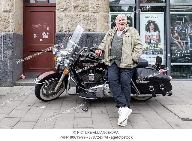 19 June 2018, Hamburg, Germany: Heinz Hoenig, ..Actor, standing at a press conference for the upcoming Harley Days in front of a Harley Davidson motorcycle