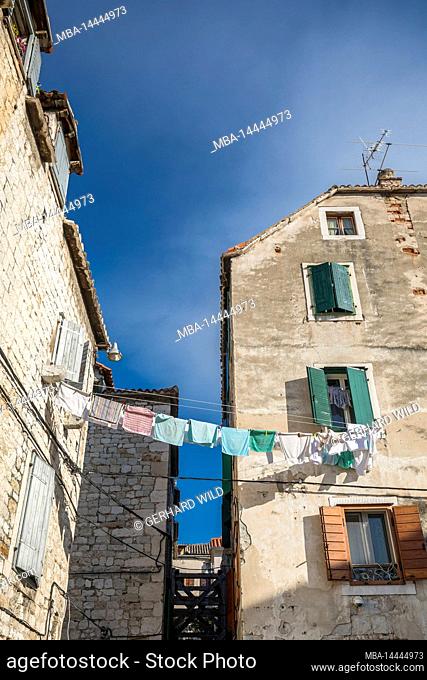Houses with stretched clothesline in the old town of Split, Split-Dalmatia County, Dalmatia, Croatia, Europe
