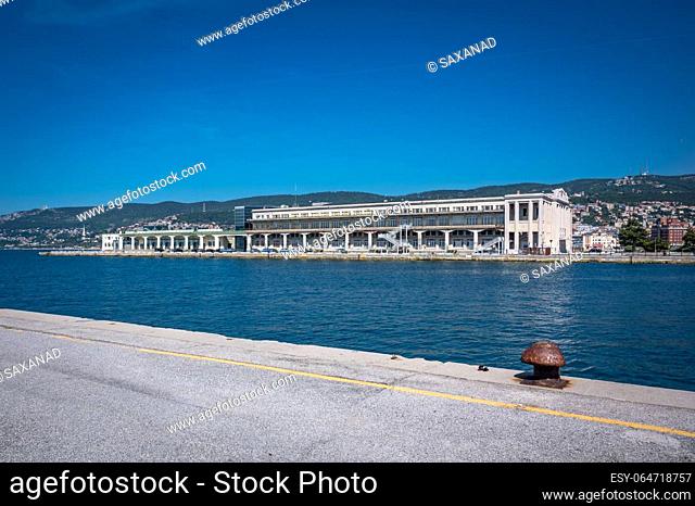 TRIESTE, ITALY - SEPTEMBER 10 2023: The old port of Trieste - Porto Vecchio , Northeast Italy. High quality photo