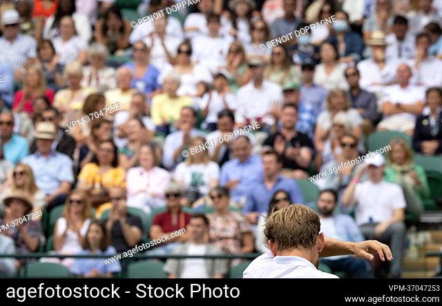 Belgian David Goffin reacts during a tennis match against UK Norrie in the 1/8 finals of the men's singles tournament at the 2022 Wimbledon grand slam tennis...
