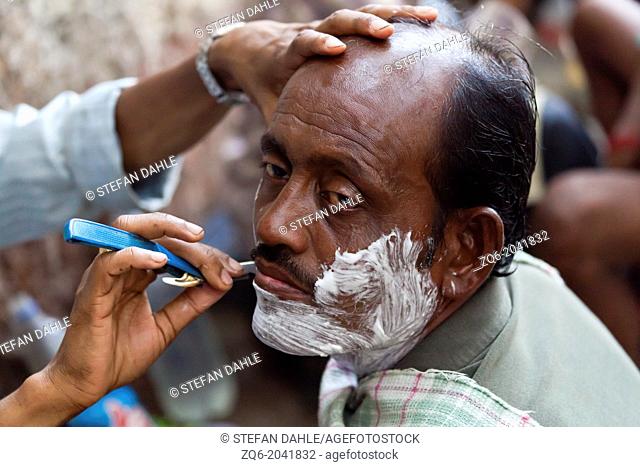 Shaving on the Street in Kolkata, India