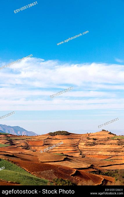 beautiful red land against a blue sky in dongchuan district, kunming city, yunnan, China