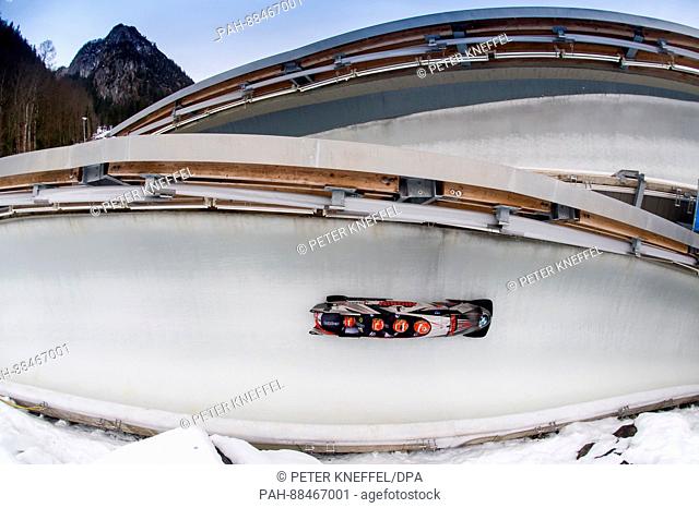 Benjamin Maier, Stefan Laussegger, Markus Sammer and Ion Danut Moldovan from Austria in action during the 3rd run of the four-man bobsleigh race in Schoenau am...