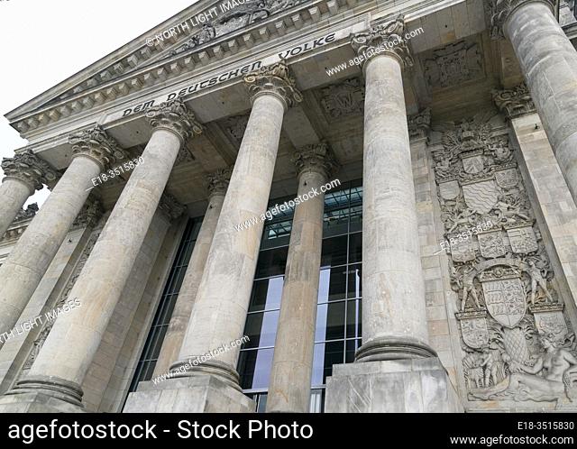 Germany, Berlin, Architectural detail of the front of the Reichstag building, home of the German Parliament, the Bundestag