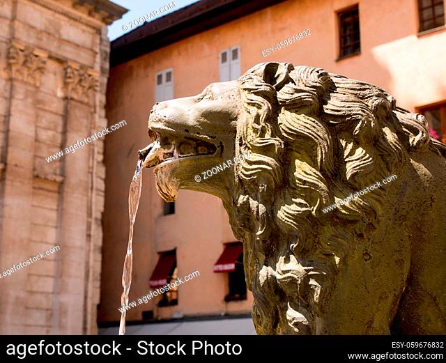 detail on the lion's head of the fountain in downtown Annecy, france