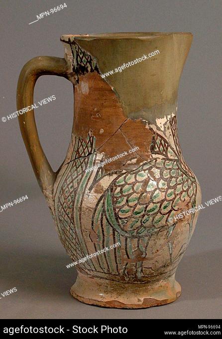 Pitcher. Date: early 15th century; Geography: Made in Orvieto, Italy; Culture: Italian; Medium: Earthenware, tin-glaze (Majolica); Dimensions: Overall: 8 1/8 x...