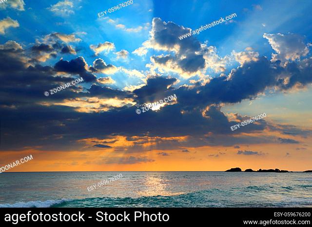 beautiful landscape with tropical sea sunset and waves