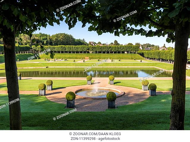 Villandry, France - August 8, 2012: Chateau Villandry and gardens with pond and fountain