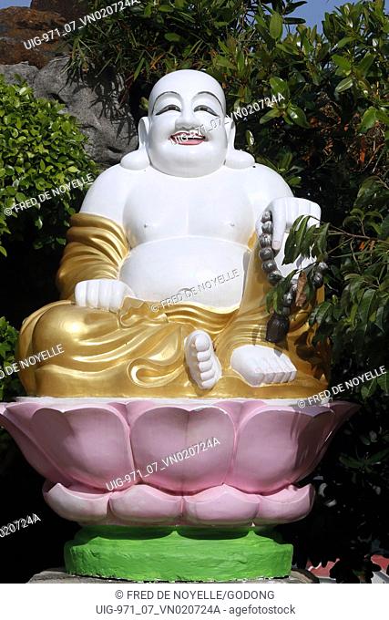 Van Hanh zen buddhist monastery. Fat happy Buddha statue for good luck and fortune. Maitreya Buddha. Dalat. Vietnam
