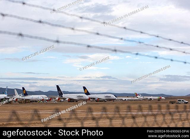 23 September 2020, Spain, Teruel: Two Airbus A380s of the airline Lufthansa are parked at Teruel Airport alongside aircraft of Iberia and TAP Air Portugal