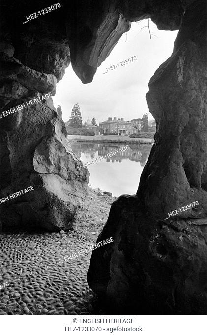 Grotto at Ascot Place, Winkfield, Berkshire, 1945. This romantic grotto was built circa 1750 by Robert Turnbull. The grotto entrance provides a view across the...
