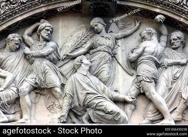 The Martyrdom of St. Stephen pediment of the front door of the Saint Etienne du Mont Church, Paris