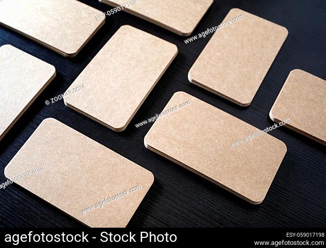 Photo of blank kraft business cards. Template for branding identity