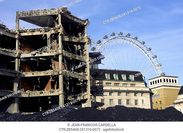 Demolition of the officially known as Greater London Council Overflow Building, Number 1 Westminster. This building was once connected to City Hall by an...