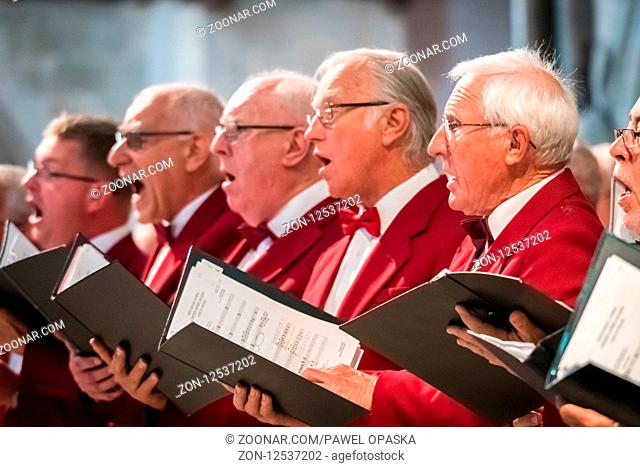Rochester, England - July 2018 : Mens choir performing in a cathedral, Kent, UK
