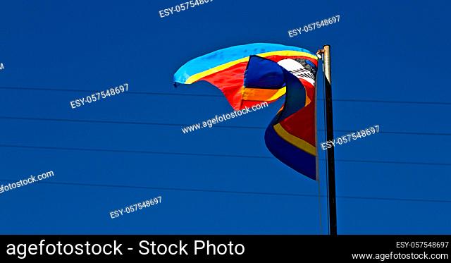 blur in swaziland waving flag and sky  like abstracr concept