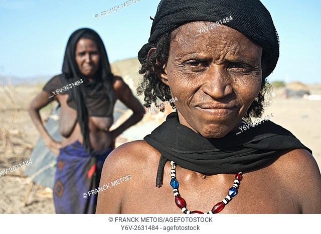 Women belonging to the Afar tribe ( Afar state, Ethiopia). Both are muslims and pastoralists. They have been photographed in their camp