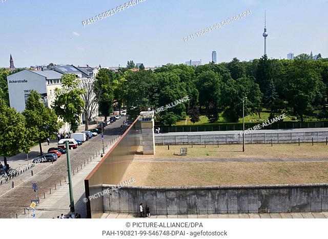 13 June 2019, Berlin: From the Visitor Centre you can see section A of the Wall Memorial on Bernauer Strasse. Here is the last part of the border fortification