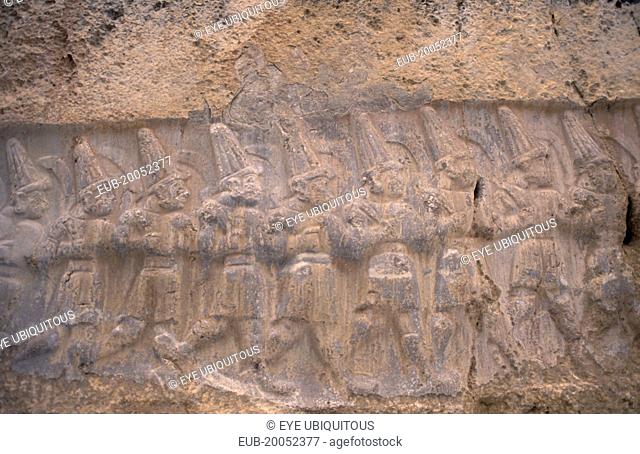 Hattusas. Ancient site of Hittite capital. Stone relief carving in the Great Temple dedicated to the storm god Teshub and the sun goddess Hebut