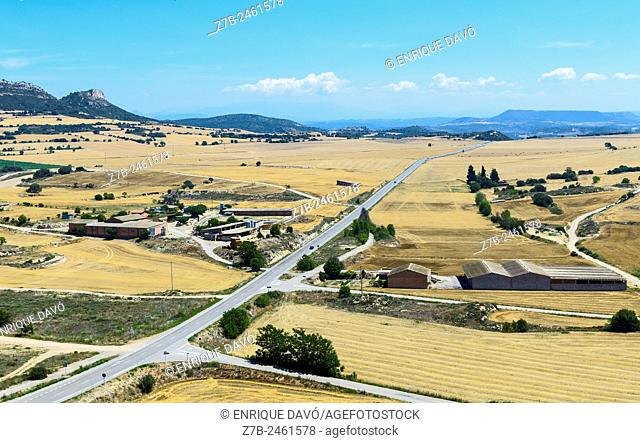 A long road high view closed to Cubells town, Lerida province, Spain
