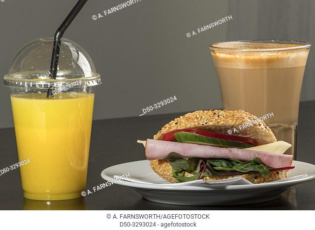 Stockholm, Sweden A breakfast ham and cheese sandwich with coffee, or latte, and orange juice
