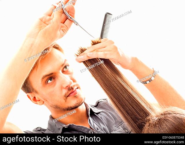 Professional hairdresser with long hair model, isolated on white background