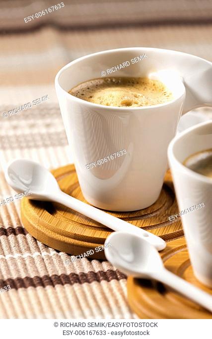 cups of coffee on place mats