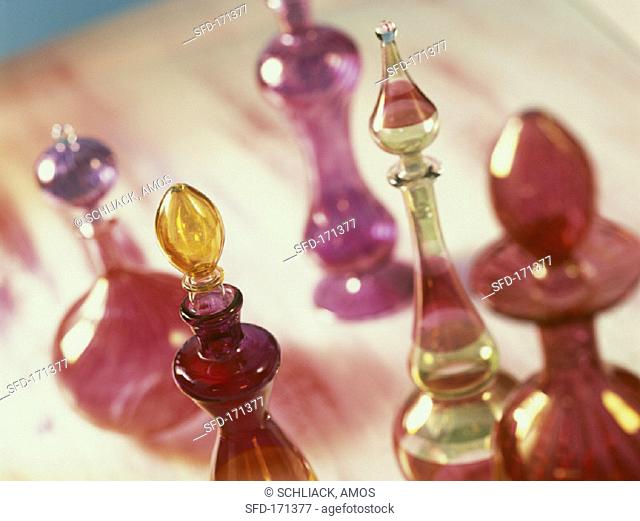 Decorated bottles of perfumed oils