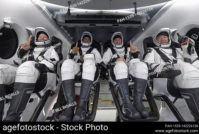 NASA astronauts Shannon Walker, left, Victor Glover, Mike Hopkins, and Japan Aerospace Exploration Agency (JAXA) astronaut Soichi Noguchi