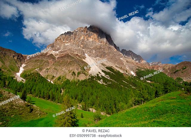 Summer evening Dolomite mountain peak in Passo di Rolle, Italy. Landscape of Passo Rolle Mountain, Pale di San Martino