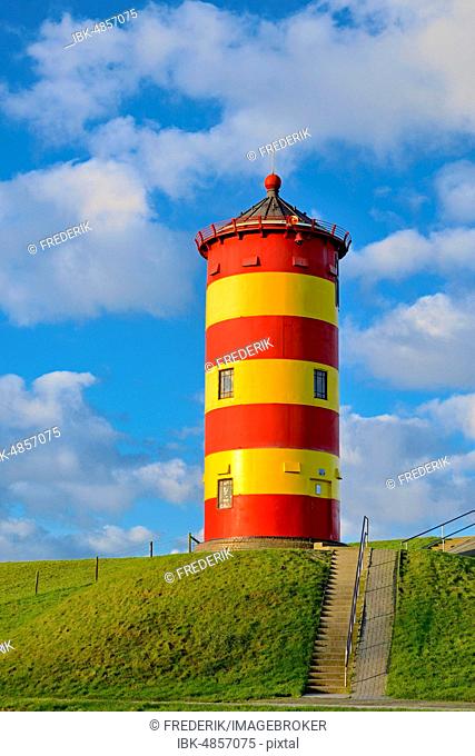 Pilsum lighthouse with blue cloudy sky, Pilsum, East Frisia, Lower Saxony, Germany
