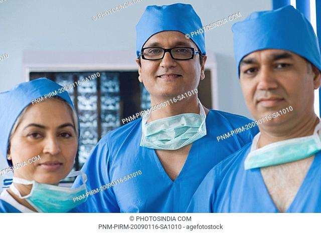 Portrait of three surgeons, Gurgaon, Haryana, India