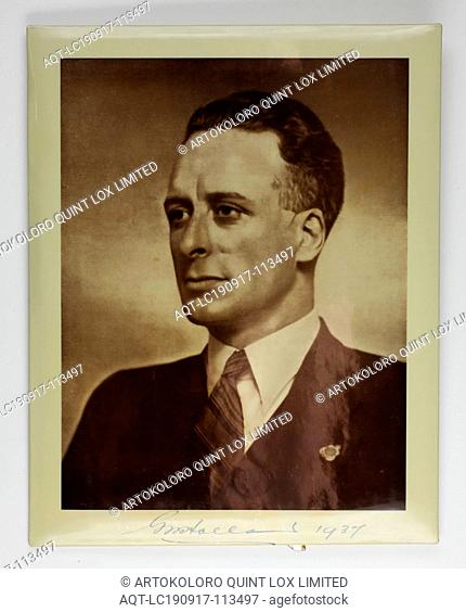 Photograph - Gilbert Payne Mulcahy, 1937, Laminated portrait of G. P. Mulcahy, dated 1937, in a brass frame. Gilbert (Gil) Payne Mulcahy enlisted into the...