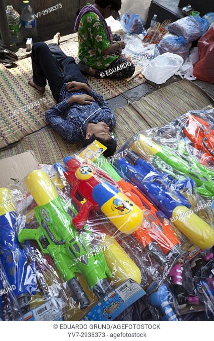 Water guns for sale. Thai New Year celebrations. Phimai, Thailand, Asia