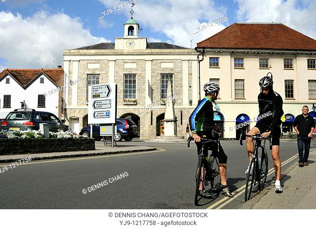 Two cyclists by the former 1807 Market House The Crown at Marlow, Buckinghamshire  The Obelisk commemorates the Hatfield to Bath turnpike road