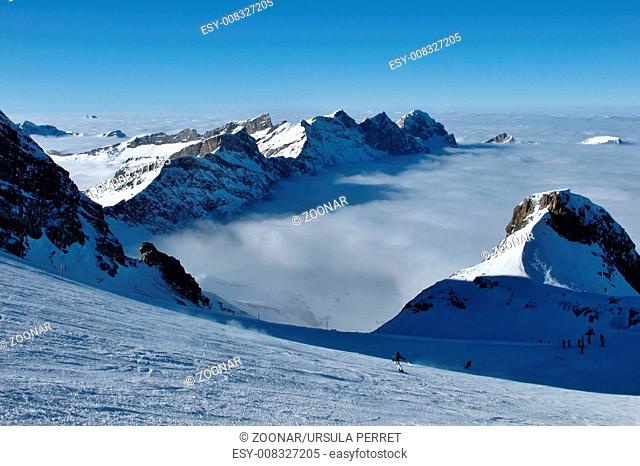 Skiing above the fog