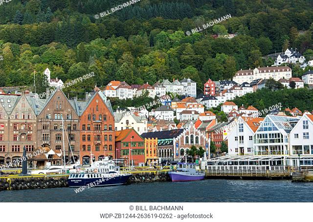 Bergen Norway Bryggen old town old and harbor with pier buildings and area for tourists in BRYGGEN area scenic color