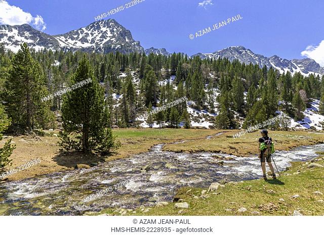 Andorra, Escaldes Engordany, hiker in the the Madriu-Perafita-Claror valley, listed as World Heritage by UNESCO