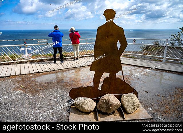 12 May 2022, Mecklenburg-Western Pomerania, Sassnitz: Visitors stand on the Königsstuhl viewing platform on the chalk coast of the island of Rügen