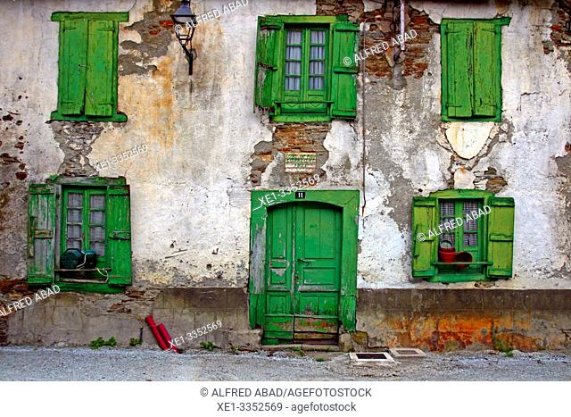 door and green windows of traditional housing, Les, Val d'Aran, Catalonia, Spain