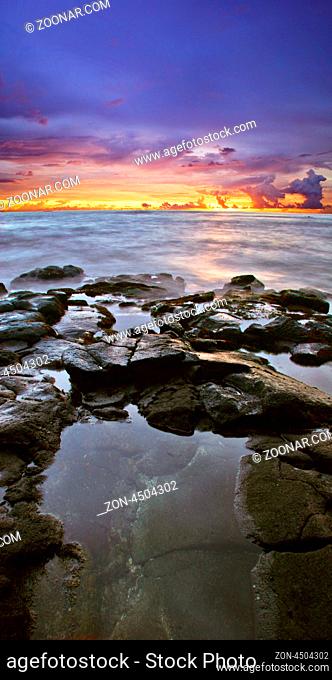 Sunset at volcanic stones beach. Big island. Hawaii