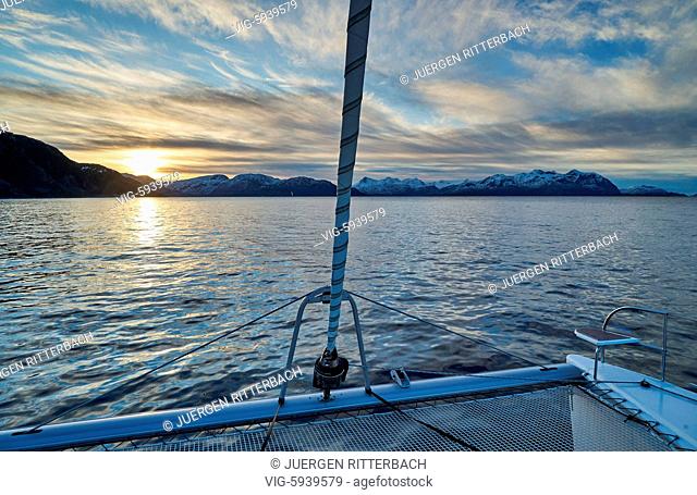 sunrise over Kaldfjord seen from sailship, Tromvik, Tromso, Troms, Norway, Europe - Tromsoe, Troms, Norway, 05/11/2017
