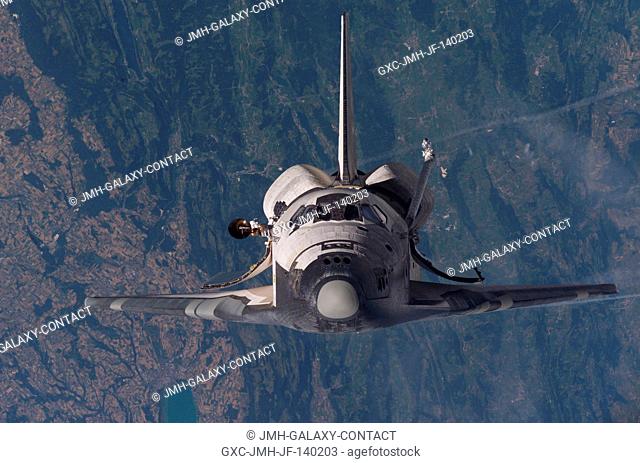Space shuttle Discovery approaches the international space station. Discovery docked to the station at 6:18 a.m. (CDT) on Thursday, July 28
