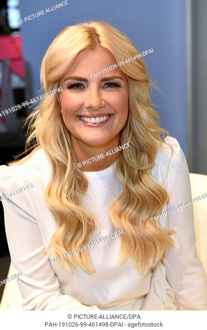 26 October 2019, Bavaria, Munich: TV presenter Jennifer Knäble smiles at the ""Bunte Beauty Days"". The event at Messe München is open until 27.10